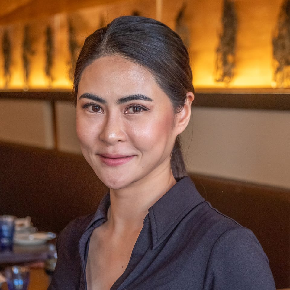 Coo Thai owner in the dining room